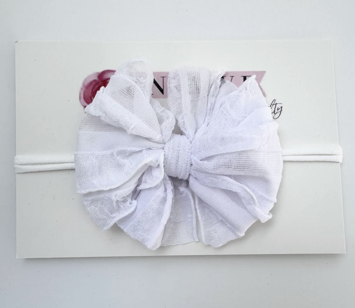 In Awe Skinny Mini Ruffled Headband- White