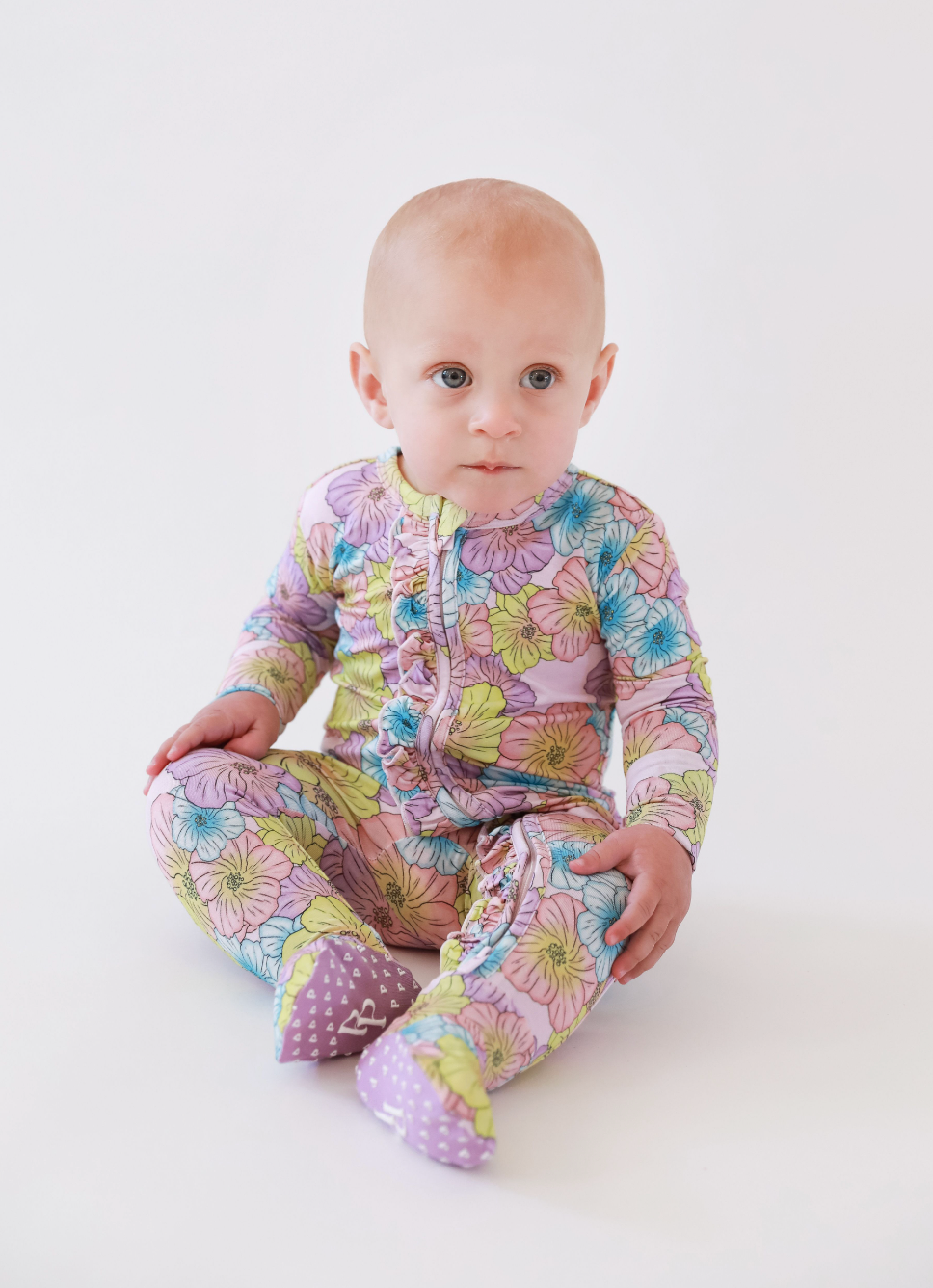 Posh Peanut Kourtney Footie Ruffled Zippered One Piece