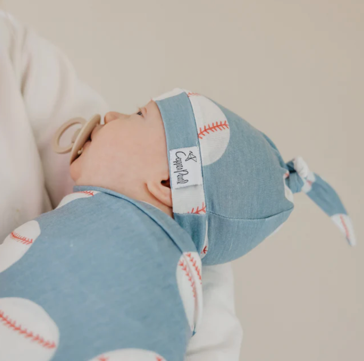 Copper Pearl Slugger Top Knot Hat