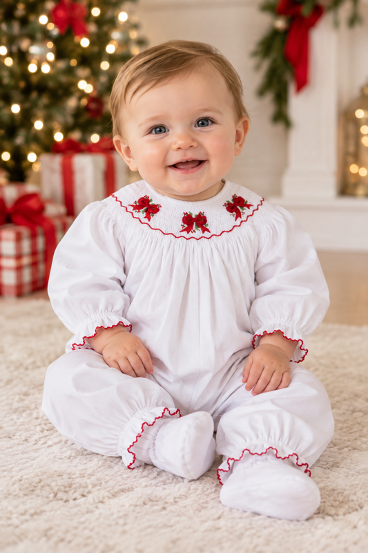 Delaney Girls White LS Smocked Holly Bow  Bishop Romper
